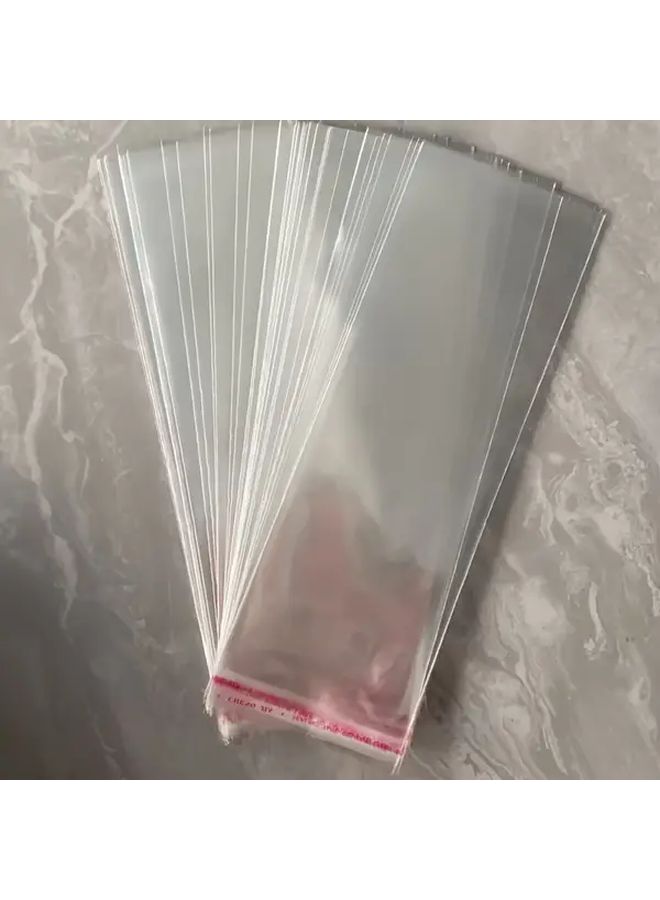 100 كيس بلاستيكي شفاف من OPP مقاس 21x8 سم مع إغلاق رباط قابل لإعادة الاستخدام لتغليف المجوهرات - Image 5