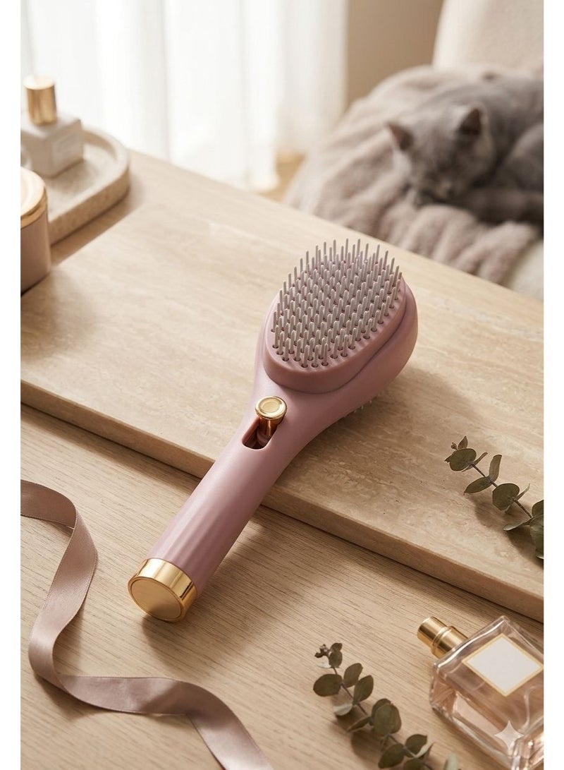 A hair brush and comb with buttons for cleaning the brush - Image 1