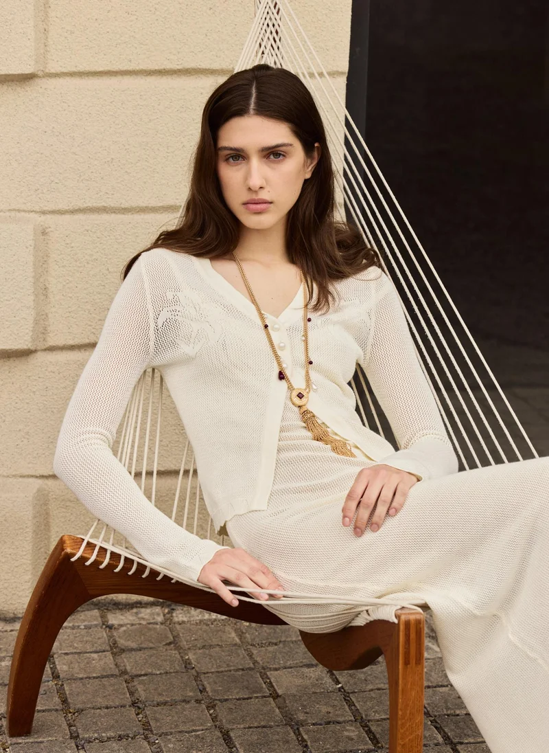 Lichi Cardigan in knitted jersey with small buttons