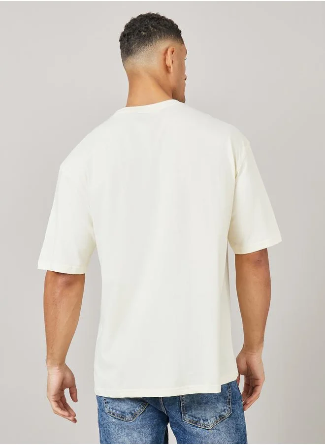 Styli Floral Print Pocket Detail Oversized T-shirt