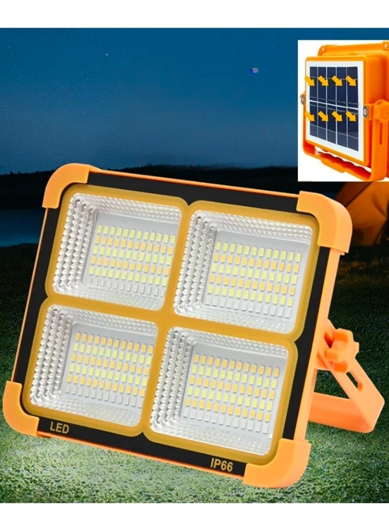 الثريات كشاف LED شمسي فائق السطوع 2000 واط رباعي الإضاءة مع لوح طاقة شمسية – مقاوم للماء IP66 كشاف خارجي قوي للتخييم والرحلات والطوارئ - Image 1