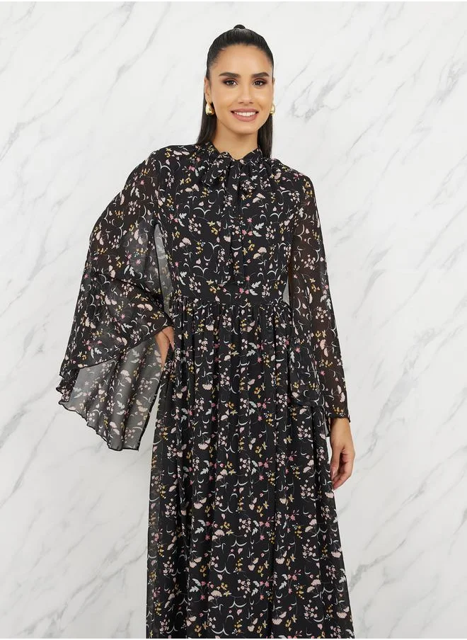 Styli Ditsy Print Tie Up Neck A-Line Maxi Dress