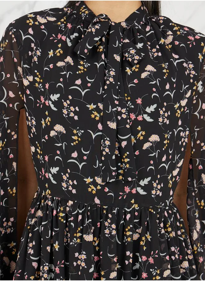 Styli Ditsy Print Tie Up Neck A-Line Maxi Dress