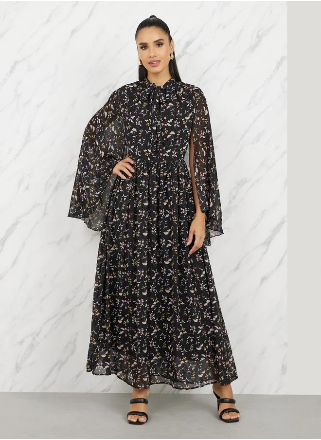 Styli Ditsy Print Tie Up Neck A-Line Maxi Dress