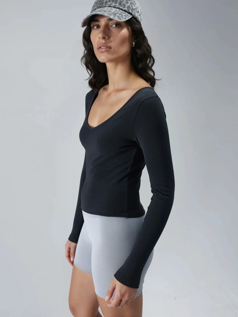 بوسيم بلوزة نسائية بأكمام طويلة وياقة على شكل حرف