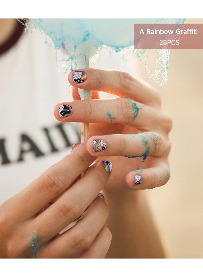 دوكاسو شرائط أظافر جل شبه معالجة، 28 قطعة من ملصقات أظافر جل الأشعة فوق البنفسجية، شرائط أظافر جل طويلة الأمد، أغطية أظافر جل عالية الجودة للمنزل، تتضمن وسادات تحضير ومبرد أظافر وعصا خشبية (جرافيتي قوس قزح) - Image 5