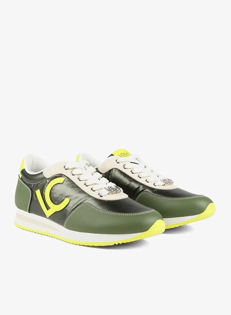 Lola Casademunt Green and lime sneakers