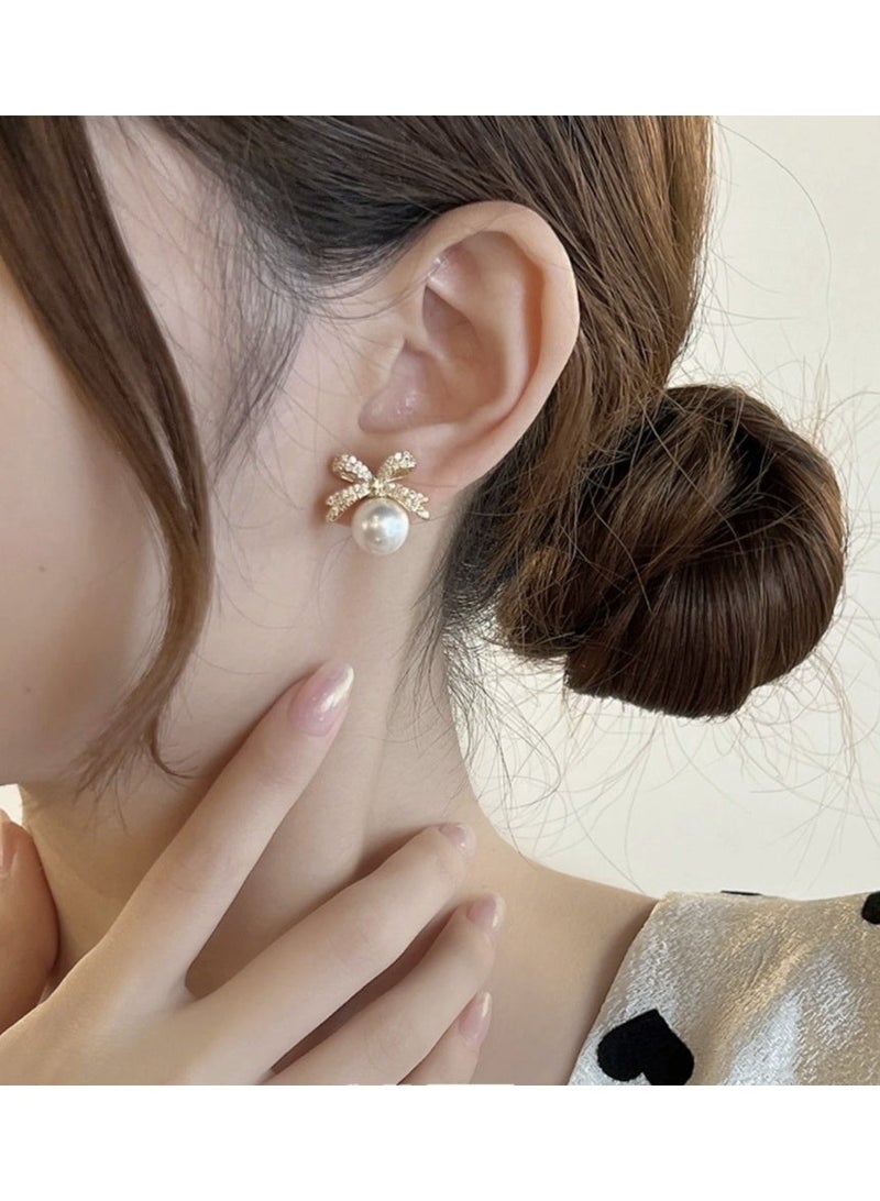 ڤيا أقراط فاخرة بشكل فيونكة مع لؤلؤة – إطلالة أنثوية راقية - Image 1