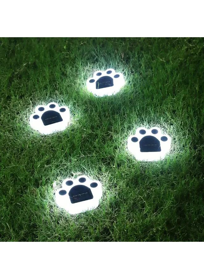 مصابيح حديقة شمسية بيضاء 4 قطع، زخرفة مسارات خارجية على شكل بصمة قدم - Image 1