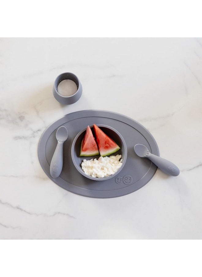 ezpz ezpz First Food Set - 100% Food Grade Silicone Suction Bowl with Built-in Placemat, Training Cup & Spoon - Designed by a Pediatric Feeding Specialist - Promotes Self Feeding - 6 Months+ (Grey)  - Image 5