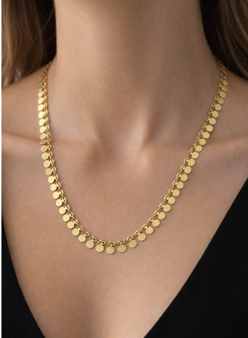 Luxuria An elegant necklace featuring a delicate chain from which hangs a collection of small, solid, round pendants with a pleasing texture; a design that combines Middle Eastern and contemporary styles. - Image 4