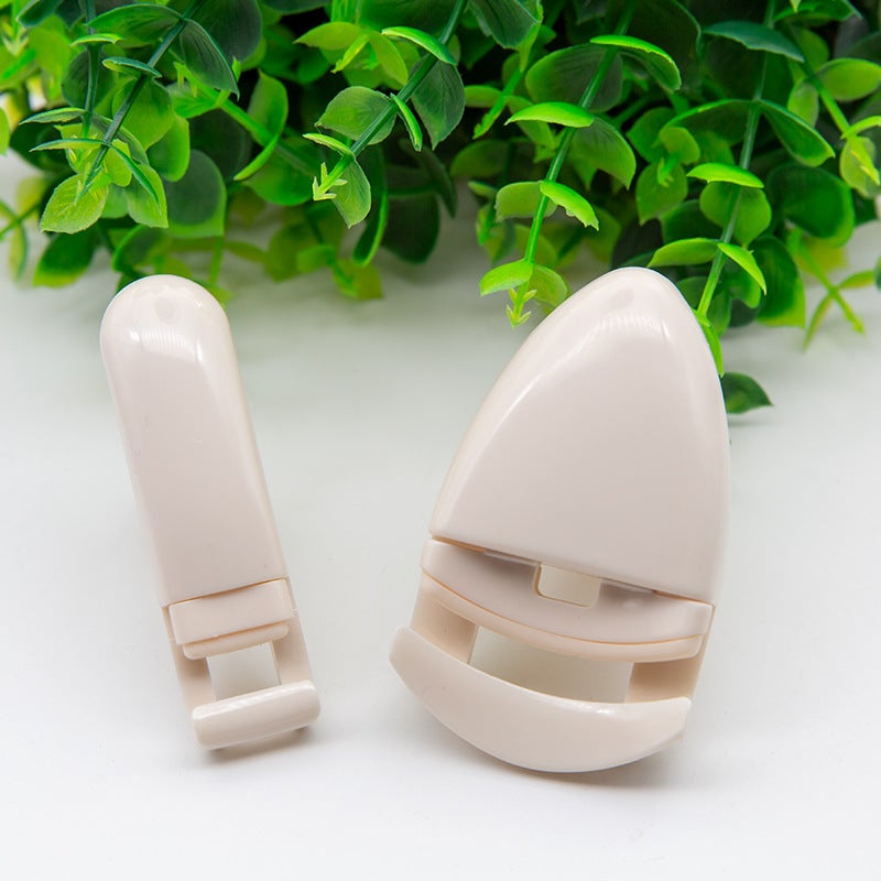 Generic New plastic eyelash curler mini eyelash curler portable Beauty Makeup Eyelash tools 2 yuan gift wholesale PVC box 7076 set in yellow bag
