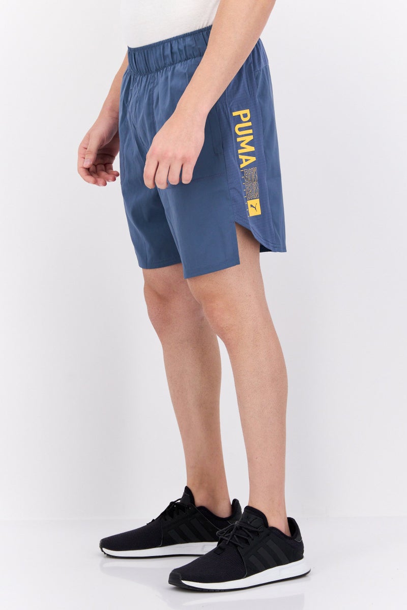 PUMA شورتات جري رياضية للرجال بشعار العلامة التجارية، أزرق داكن - Image 2