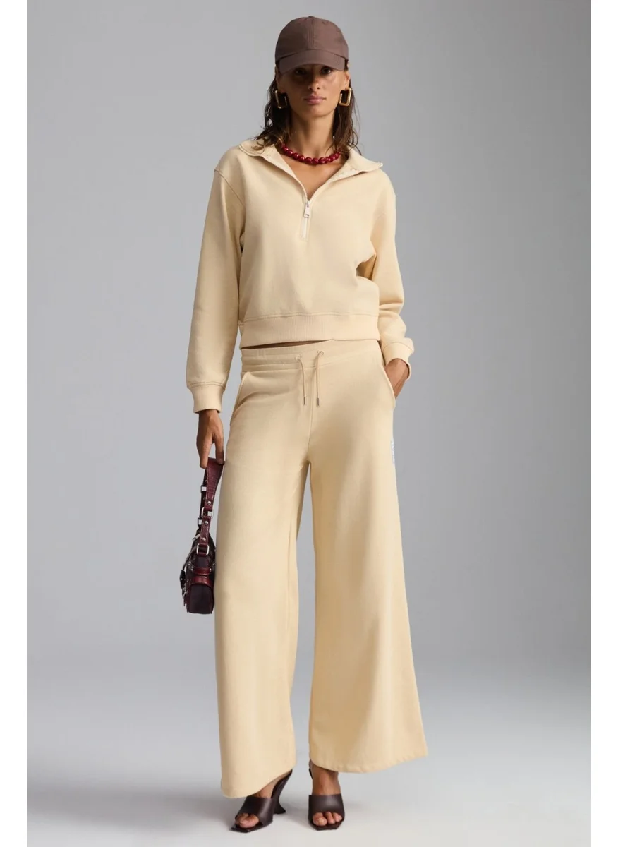 جريميلانج Laury Women's 100% Organic Cotton Soft Wide Leg Regular Label Detailed Cream Sweatpants