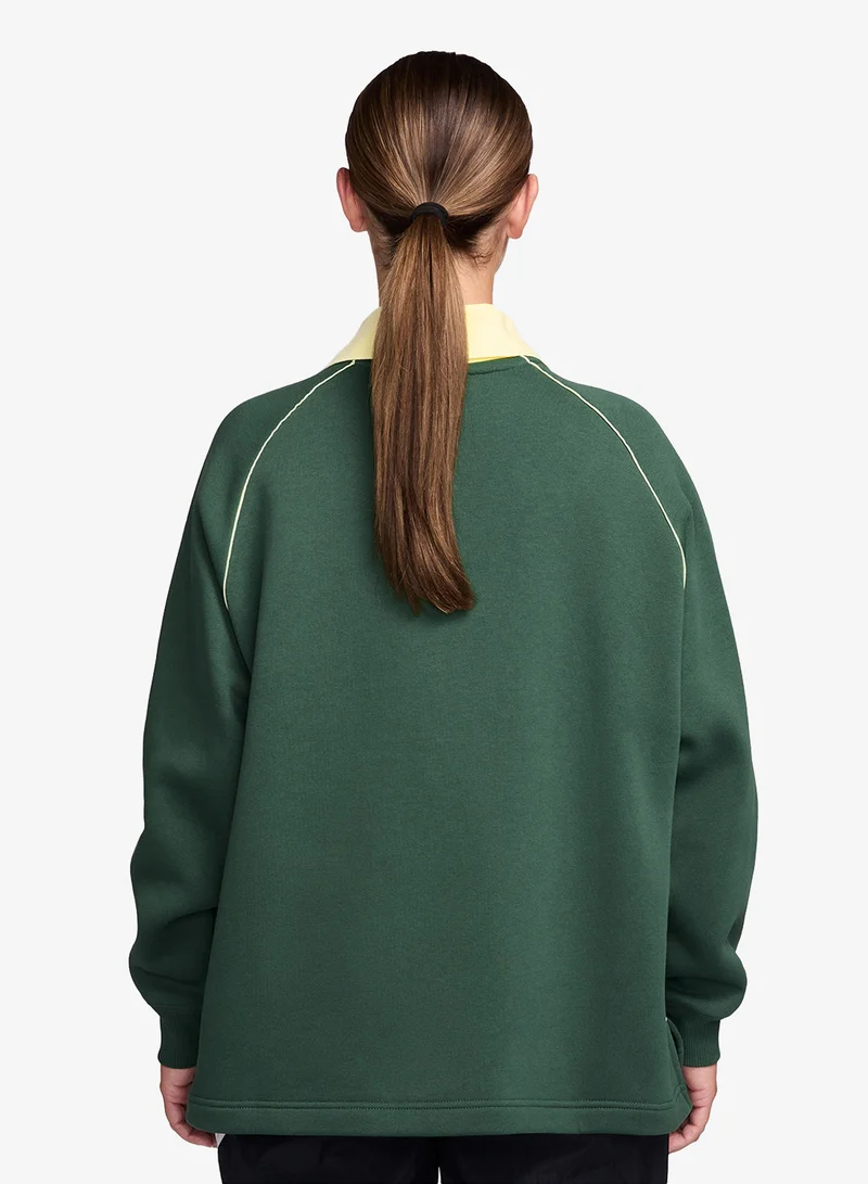 نايكي بلوزة بولو واسعة من صوف فينيكس