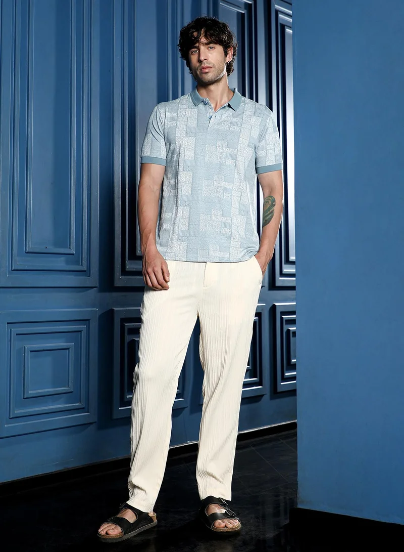 Campus Sutra Men Lattice-Geometric Jacquard Polo T-Shirt | Jacquard Polo Neck, Short Ribbed-Cuff Sleeves | Half-Button , Straight Hem | Floral Jacquard Knitted Fabric For Casual & Daily Wear | Blue