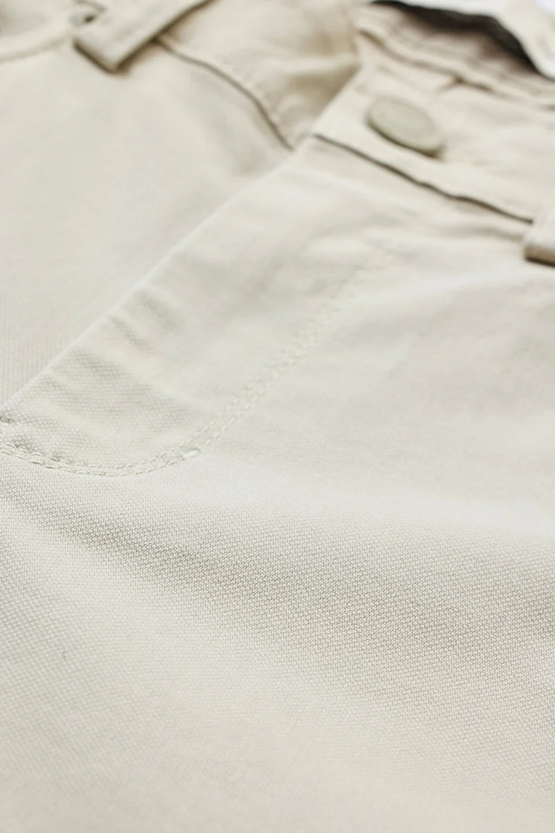 SNITCH بنطلون بيج فاتح مطاطي بقصة عادية