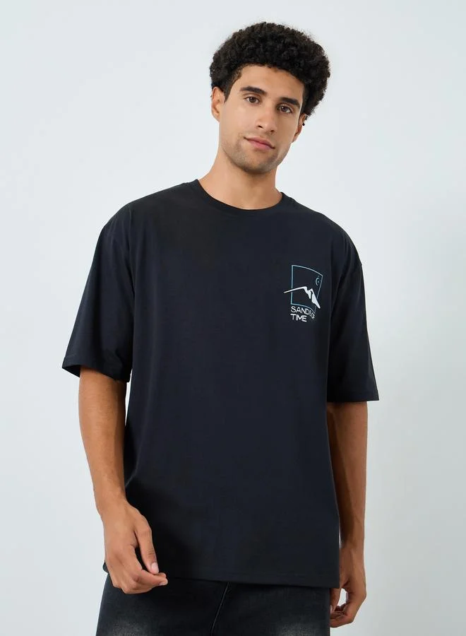 Styli Men Black Graphic Print Oversized T-Shirt