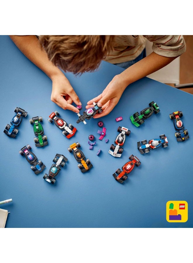 ليغو ليجو ميني فيجرز سيارات سباق فورمولا 1 القابلة للاقتناء – احصل على سيارتين من أصل 12 نموذج سيارة مصغّرة مع خوذات السائقين وعجلات متحركة – فرق الفورمولا 1 تشمل فيراري، مرسيدس، ماكلارين، ريد بُل – علبة مفاجأة (عبوة من قطعتين) – 71049 - Image 5