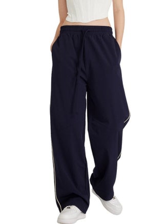 Unisex Men and Women Drawstring Baggy Wide Bottom Leg Long Side Stripe Track Pant - pzsku/Z3529C0F3C8CAA448EAFCZ/45/1746227818/0bcfc1ad-db1e-45b8-9a05-b7b2bea8ac6f