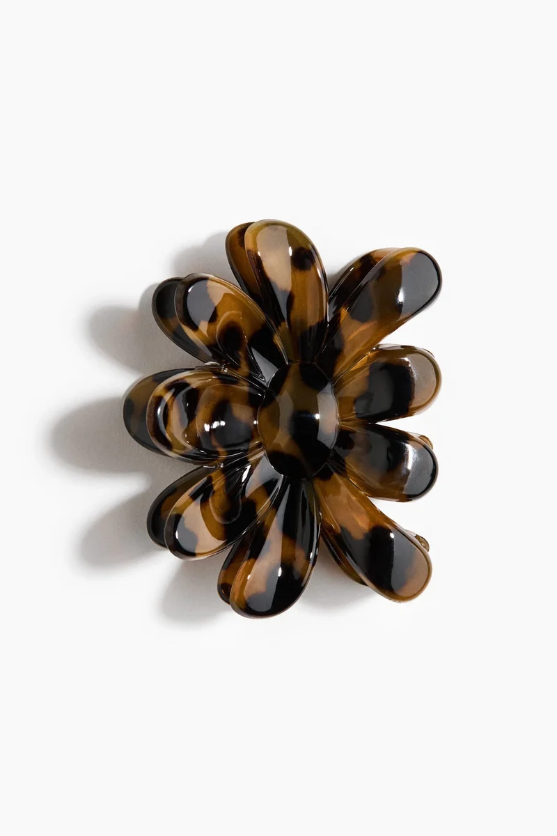 اتش اند ام مشابك شعر بشكل زهرة