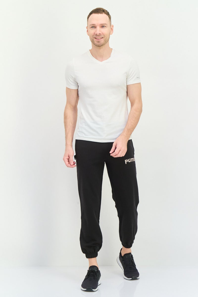 PUMA Men Relaxed Fit Outdoor Sweatpants, Black - Image 4