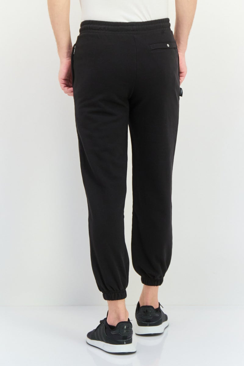 PUMA Men Relaxed Fit Outdoor Sweatpants, Black - Image 3