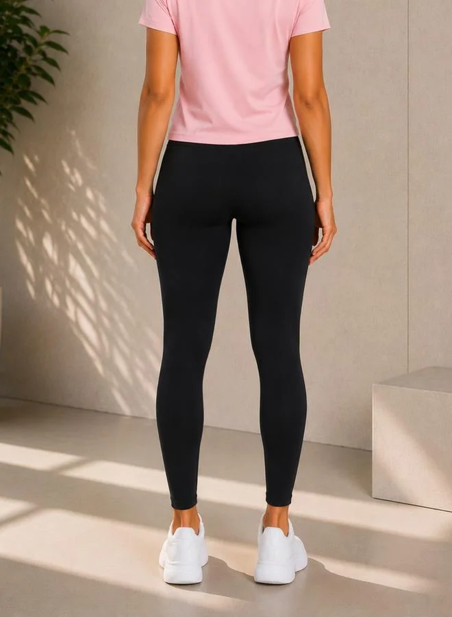 تايك تو Black Solid Active Leggings with Logo Print By Lazzycat