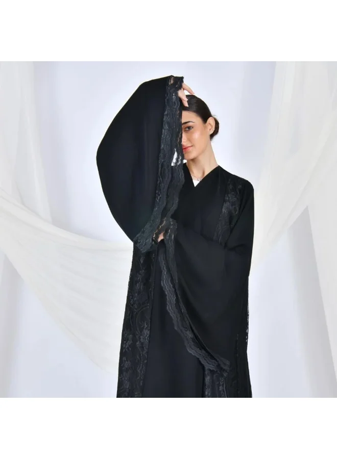 lamha abaya Elegant black wrap abaya with quarter-cloche sleeves and lace overlay