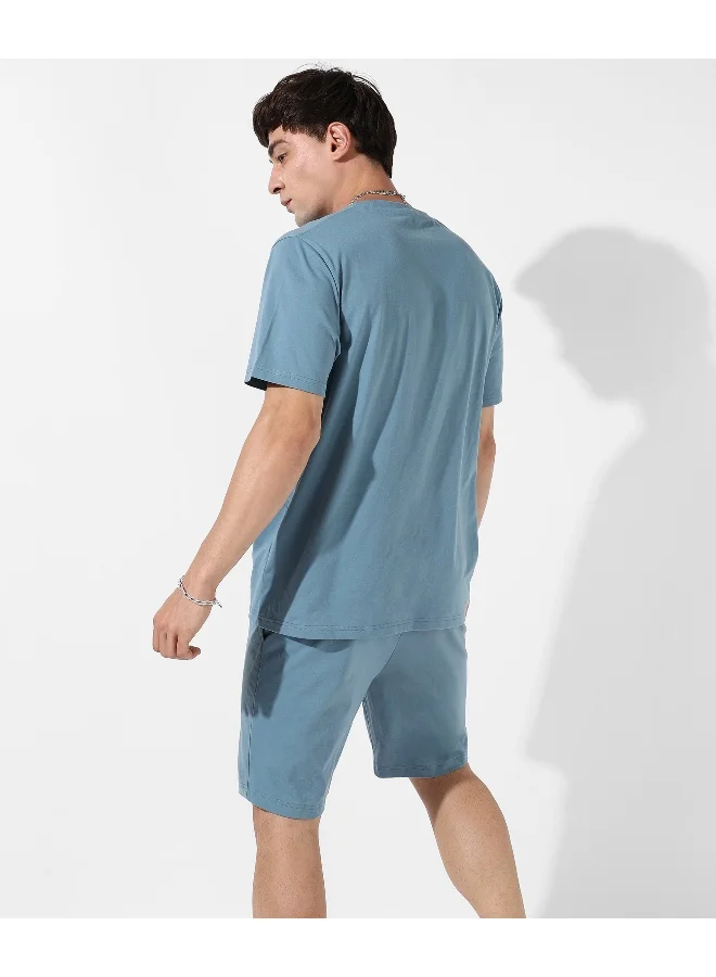 Campus Sutra Men's Solid Blue Casual Co-Ord Set For Casual Wear | Cotton Poly Lycra Fabric | Pull On T-Shirt | Pull On Shorts | Clothing Set Crafted With Comfort Fit & High Performance For Everyday Wear