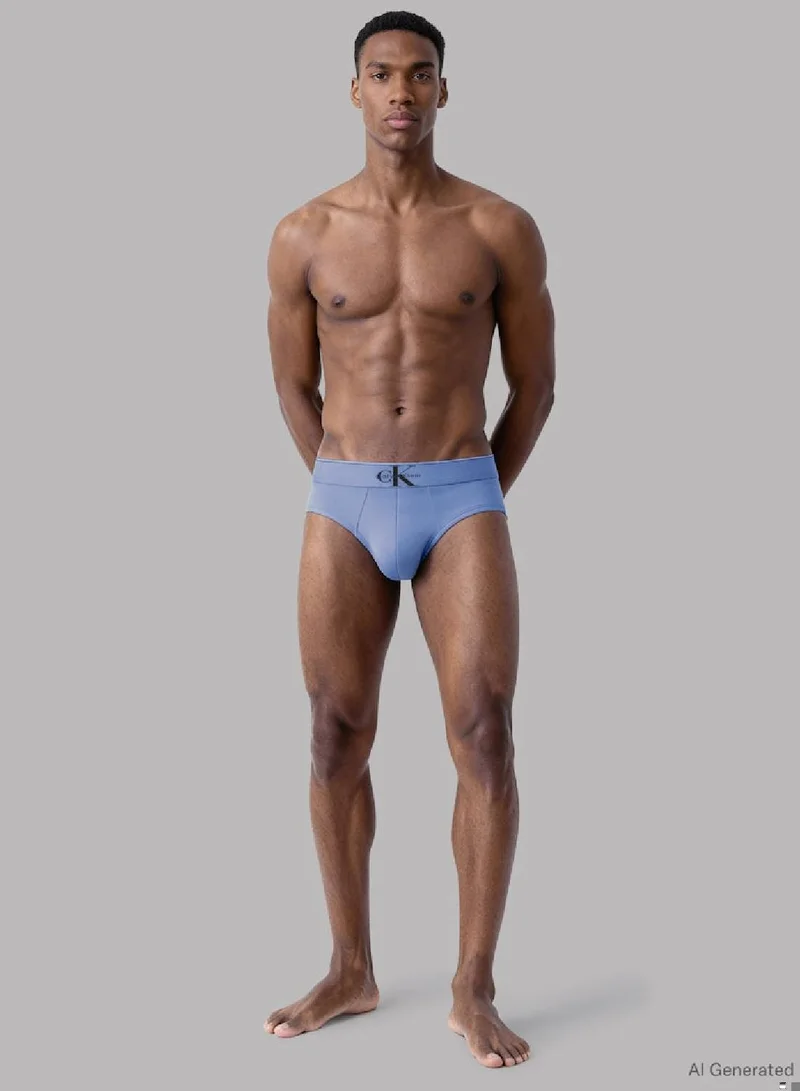 CALVIN KLEIN BLACK w/ BLUE RIVER FOG/BLUE RIVER 3 Pack Briefs - Graphic Monogram Cotton Stretch for Men | Best Price UAE