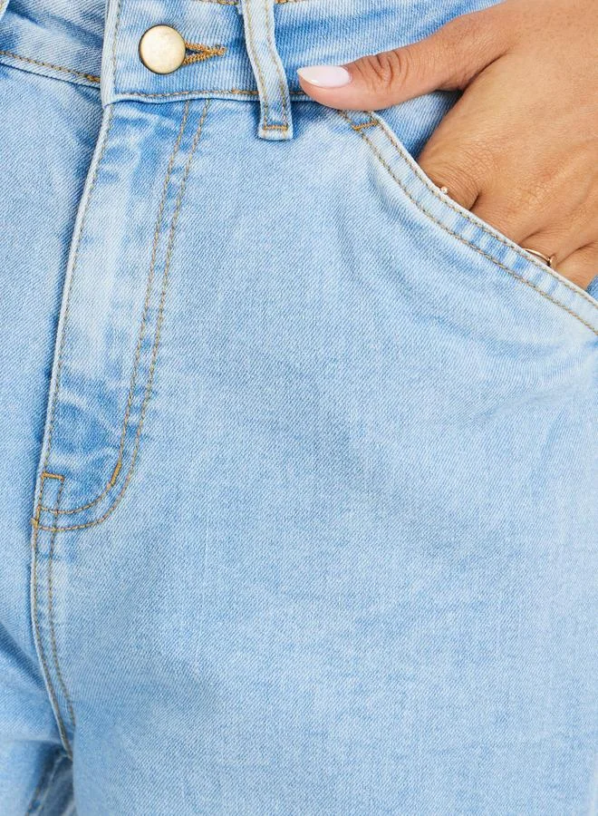 ستايلي جينز واسع الساق بخصر متوسط وغسيل فاتح من Styli