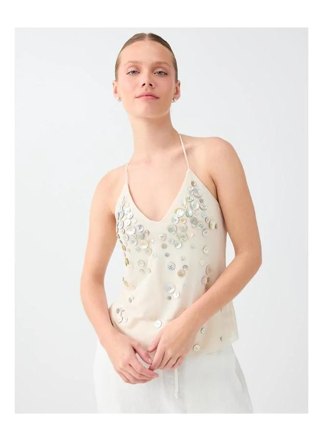Jimmy Key Mesh Blouse with Stone Button Detail and Neck Tie.