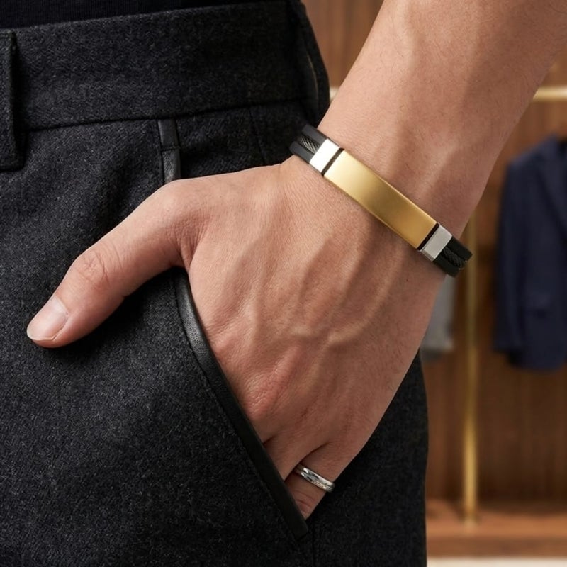 A luxurious, modern men's bracelet, combining black silicone with an artistic wire touch and a gold-colored stainless steel piece, a blend of strength and elegance for everyday wear. - Image 3