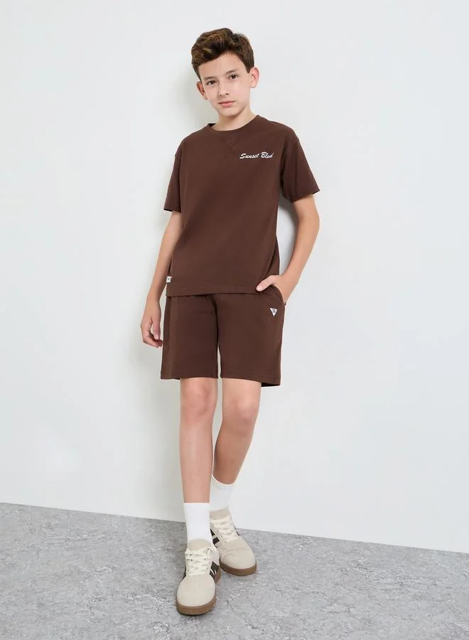 ستايلي Overlock Stitch Oversized T-Shirt and Drawstring Shorts Set
