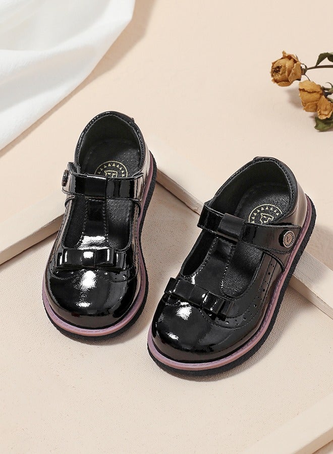 تارانيس أحذية أطفال تارانييس الكلاسيكية باللون الأسود اللامع مع فيونكة - Image 1