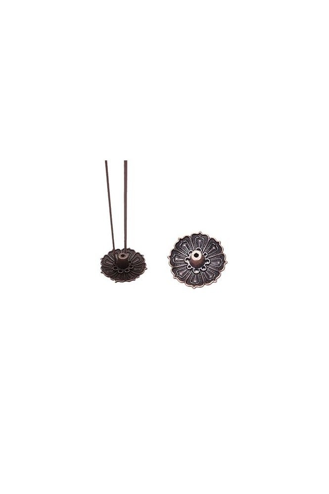 "An elegant and luxurious metal incense burner with artistic engravings.  "  - Image 2