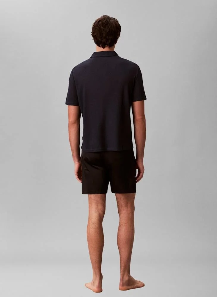 كالفن كلاين قميص بولو شاطئي ناعم محبوك