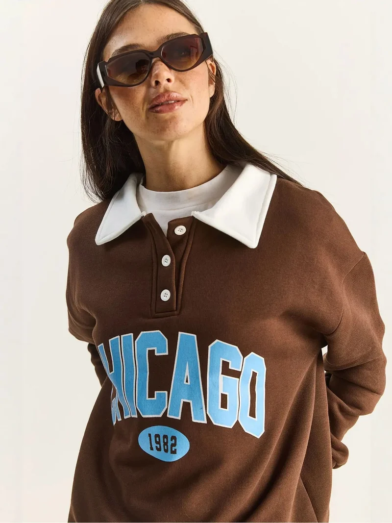 Bianco Lucci Dark Mocha Brown LUCCI Oversized Printed Sweatshirt for Women | Best Price UAE