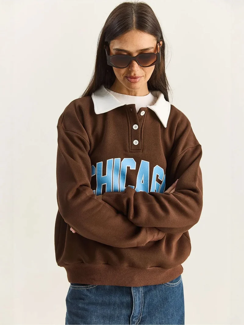 Bianco Lucci Dark Mocha Brown LUCCI Oversized Printed Sweatshirt for Women | Best Price UAE