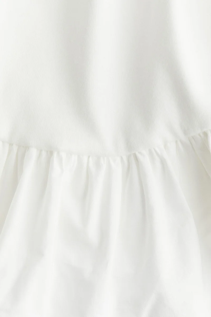 اتش اند ام بلوزة بدون أكمام بياقة فقاعية