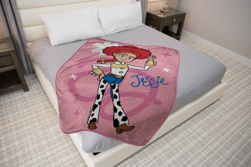 Jay Franco Plush Throw Blanket â€“ 46" x 60" Inches Kids Hero Soft & Cozy Fleece Throw for Bedroom & Couch DÃ©cor, Official Licensed Product, Pink - Toy Story Jessie - Image 4