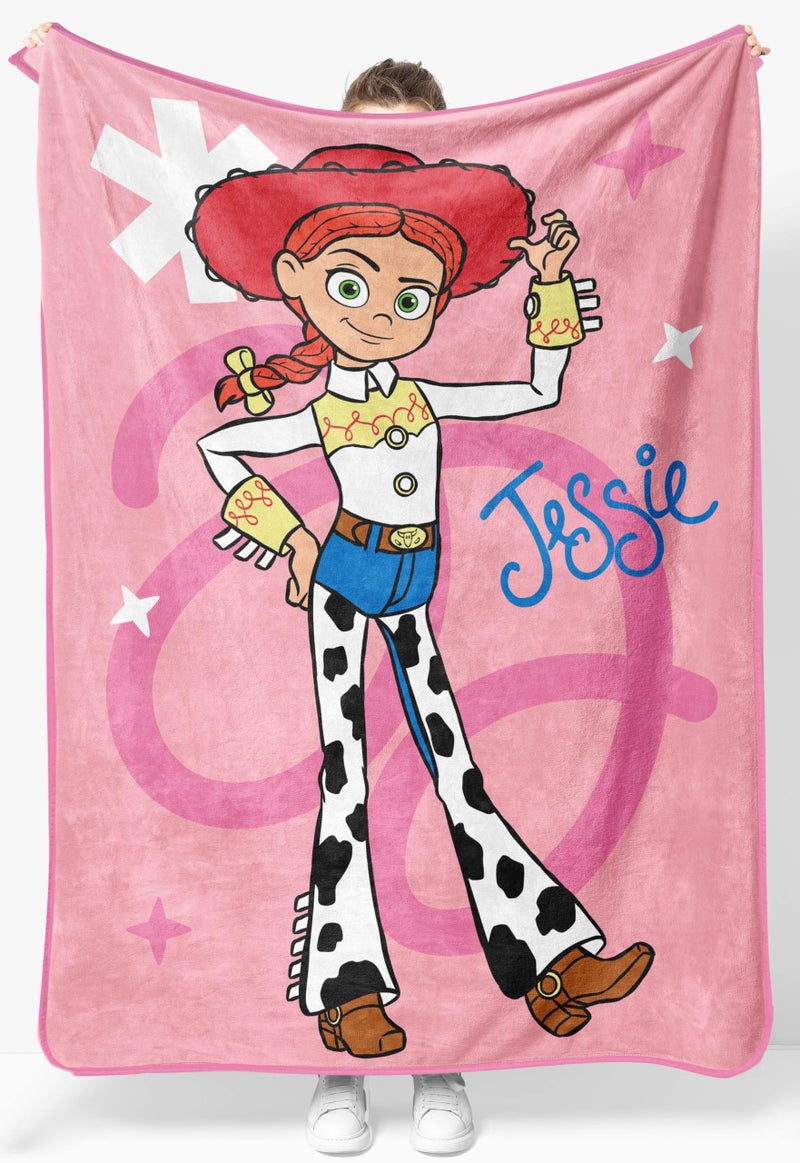 Jay Franco Plush Throw Blanket â€“ 46" x 60" Inches Kids Hero Soft & Cozy Fleece Throw for Bedroom & Couch DÃ©cor, Official Licensed Product, Pink - Toy Story Jessie - Image 1