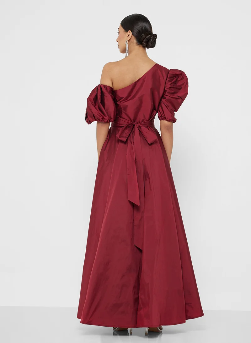 Namshi x Puff Sleeve Ball Gown With Asymmetric Neck