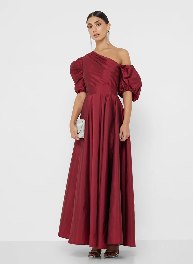 Namshi x Puff Sleeve Ball Gown With Asymmetric Neck