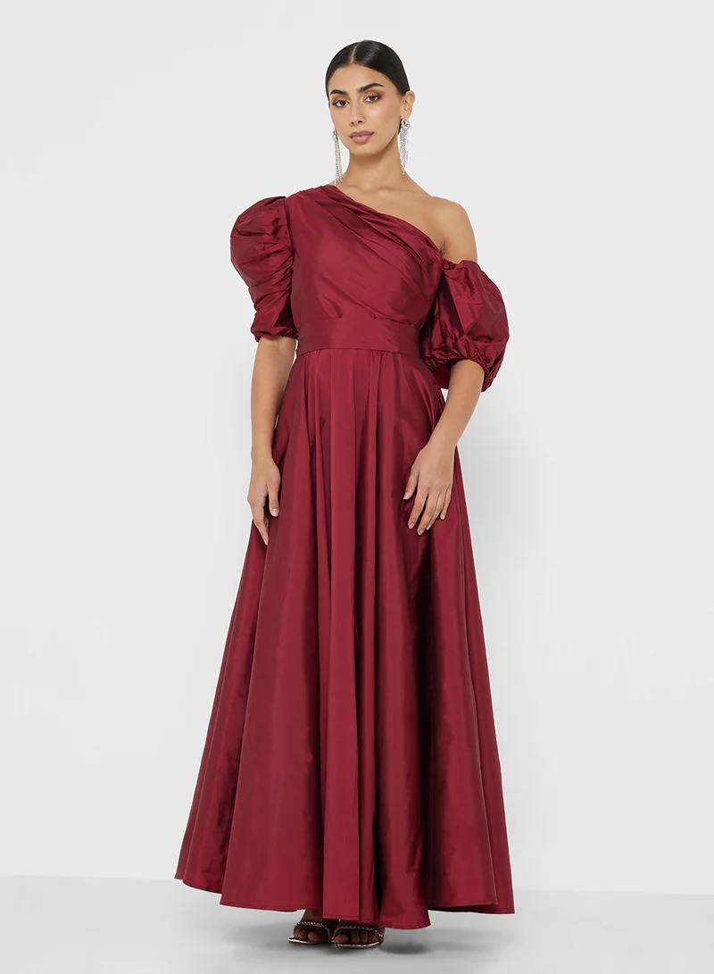 Namshi x Puff Sleeve Ball Gown With Asymmetric Neck