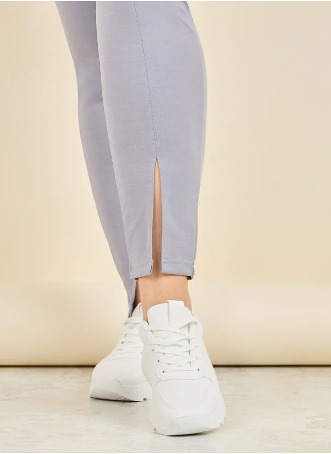 ستايلي Front Slit Hem Ponnte Legging
