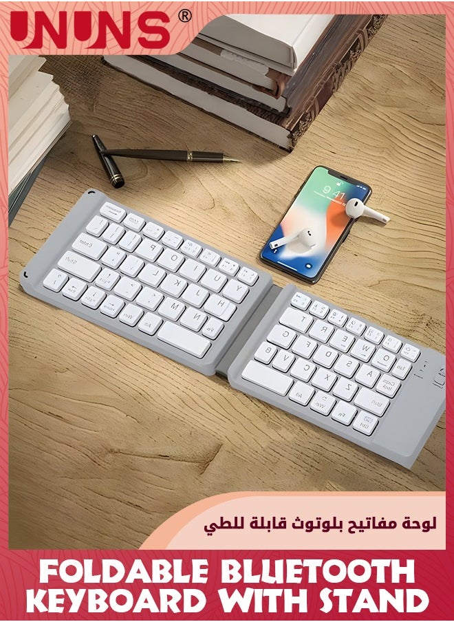 UNUNS - لوحة مفاتيح بلوتوث قابلة للطي، لوحة مفاتيح لاسلكية محمولة مع حامل حامل، لوحة مفاتيح قابلة لإعادة الشحن بحجم الجيب نحيفة للغاية، متوافقة مع IOS/Android/Windows، والهواتف الذكية/الكمبيوتر اللوحي/الكمبيوتر المحمول، رمادي أبيض - Image 1