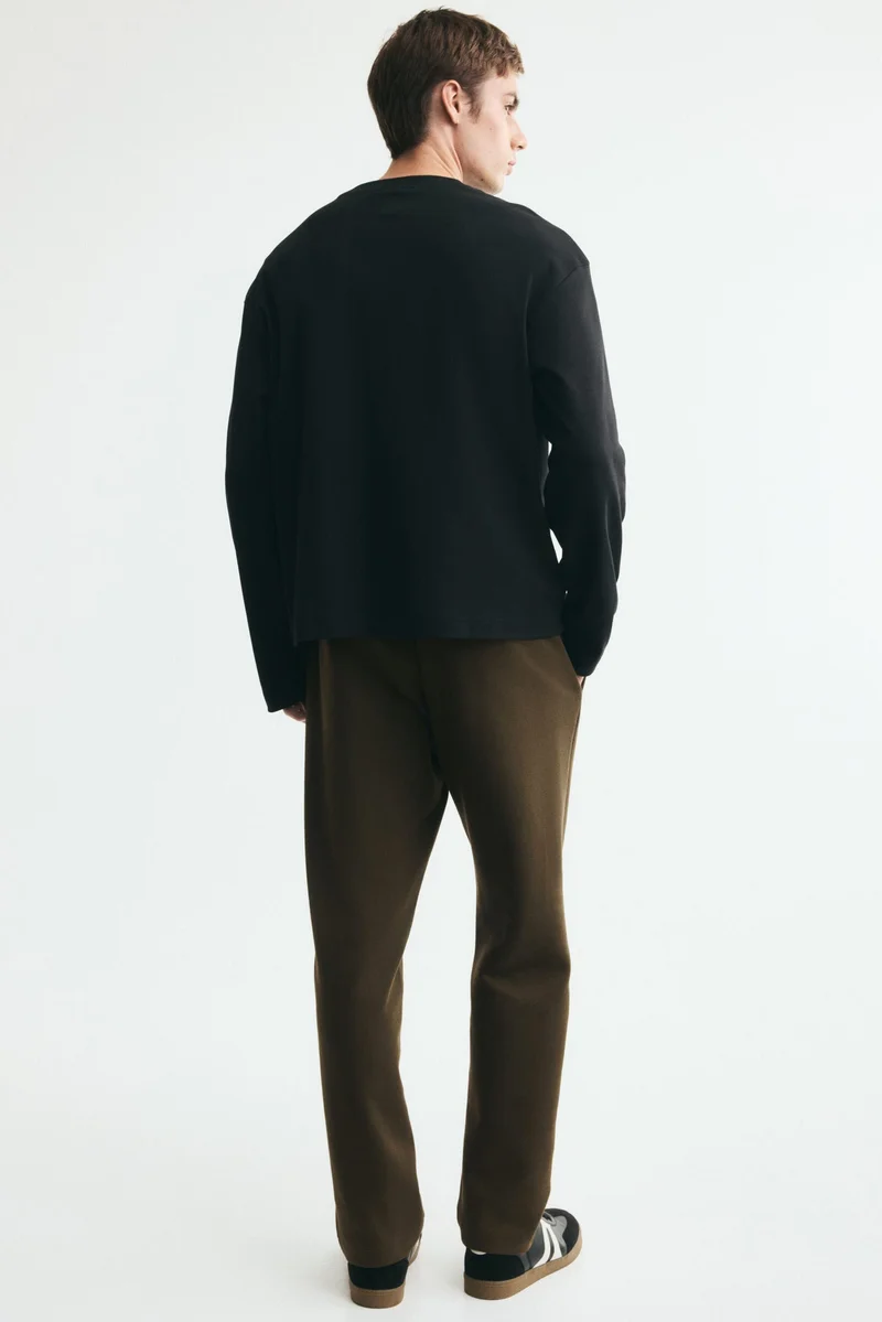 H&M  Regular Fit Interlock crease-front joggers for Men | Best Price UAE