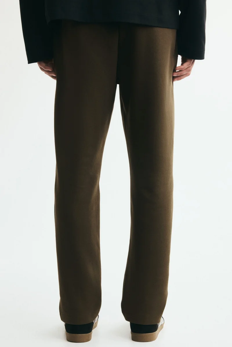 H&M  Regular Fit Interlock crease-front joggers for Men | Best Price UAE